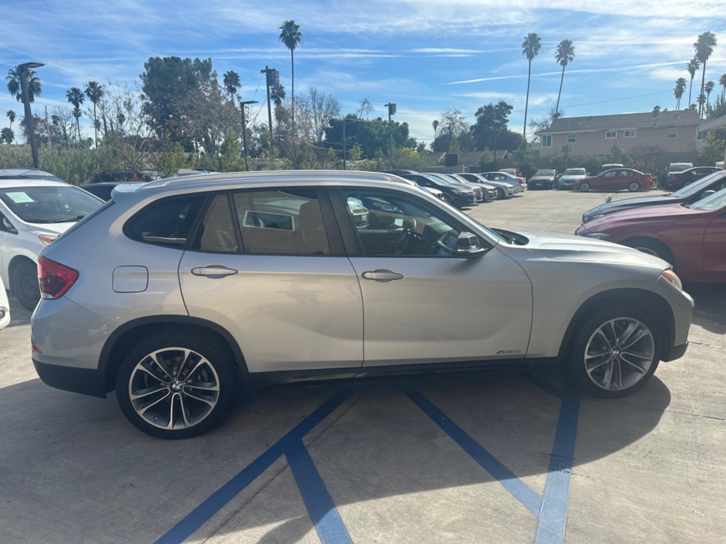 2013 Silver Metallic /Black BMW X1 sDrive28i (WBAVM1C59DV) with an 2.0L L4 DOHC 16V engine, 8-Speed Automatic transmission, located at 30 S. Berkeley Avenue, Pasadena, CA, 91107, (626) 248-7567, 34.145447, -118.109398 - Leather Seats! Premium Wheels! This 2013 BMW X1 sDrive28i looks and drives well. Bad Credit? We can help! We are the bank. All our cars are thoroughly inspected and reconditioned by our technicians. FREE CARFAX report. Stop by or call to speak with our friendly staff. Whether you have bad credit, no - Photo#5